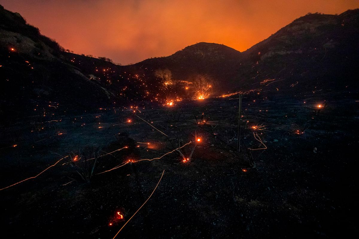 A time exposure shows embers from Saddleridge Fire blown by the wind in the Porter Ranch section of Los Angeles, California, on 11 October 2019. Photo: AFP
