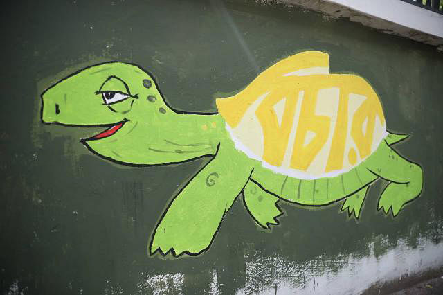 Graffiti that reads `Justice` is painted on the back of a tortoise, a satire on Bangladesh`s slow pace of the judiciary.
