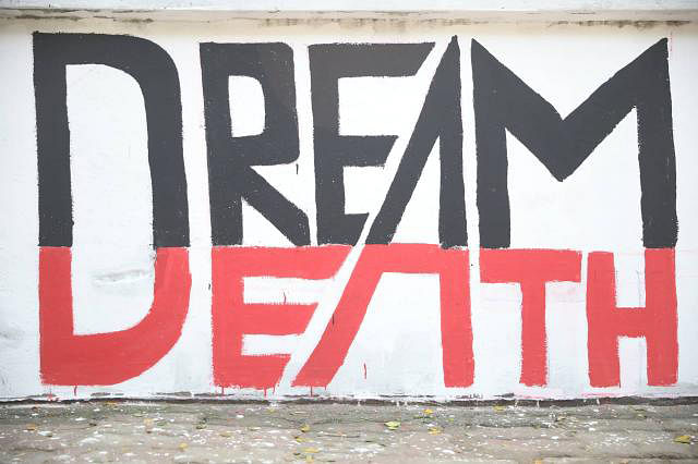 This graffiti reads `Dream Death`. Abrar came to BUET with the dream of becoming an engineer but left his dormitory as a dead body.