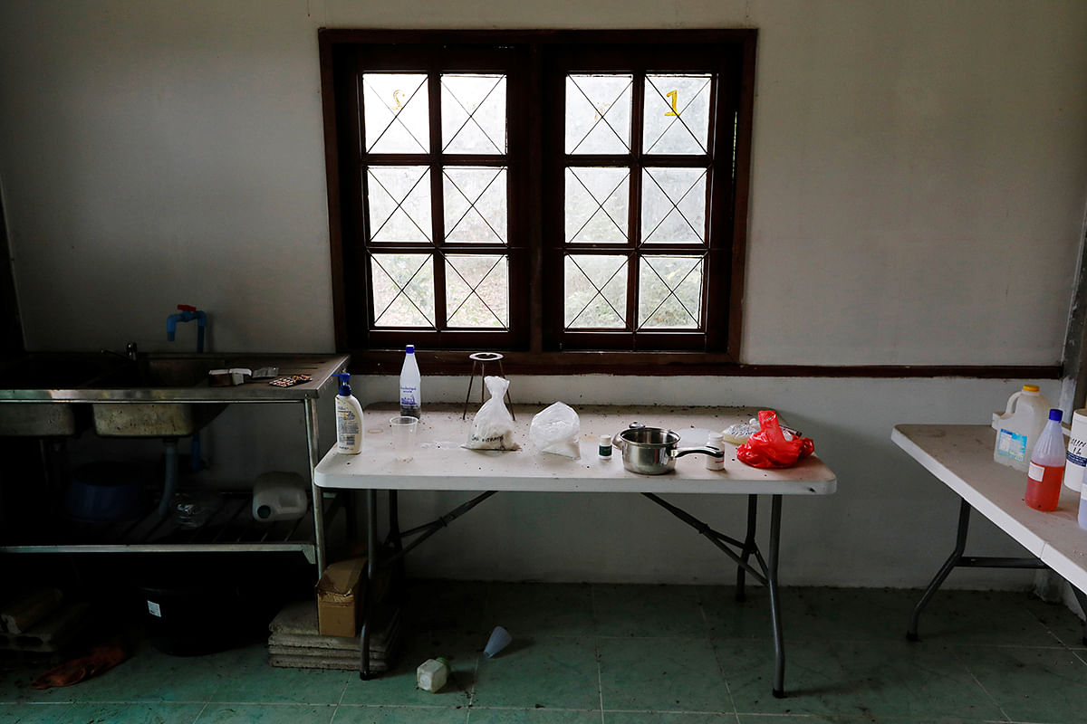 A small meth lab, which police suspect was used to experiment with new recipes, is seen inside a raided compound belonging to Sue Songkittikul, a suspected Sam Gor syndicate operations chief, in Mae Sot. Photo: Reuters