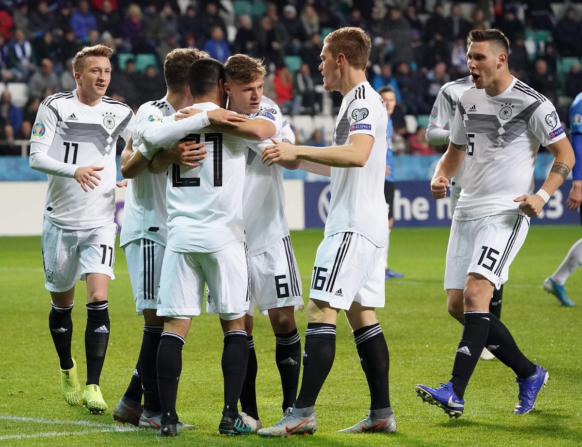 Germany`s midfielder Ilkay Gundogan (3rdL) celebrates scoring with his team-mates during the Euro 2020 qualifier Group C Estonia v Germany in Tallinn, Estonia, on Sunday. Photo: AFP
