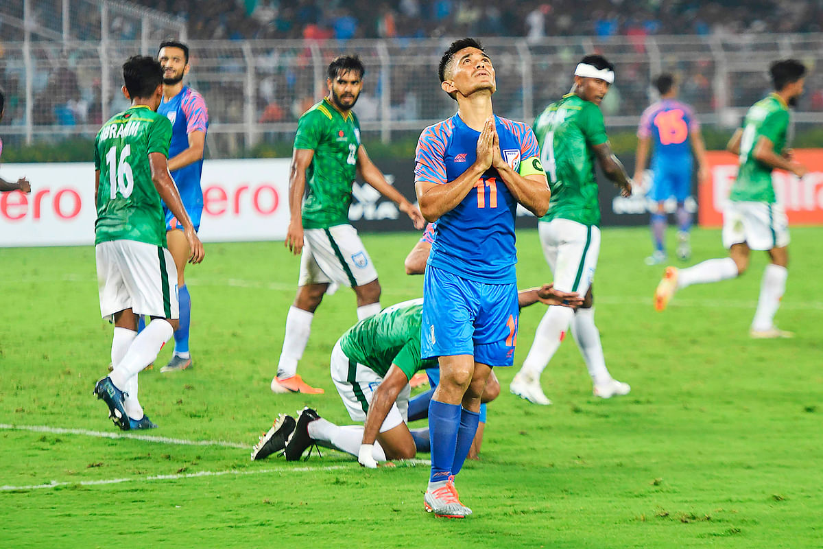 India`s football captain Sunil Chhetri (C) reacts after missing a goal during the World Cup 2022 and 2023 AFC Asian Cup qualifying football match between India and Bangladesh at the Vivekananda Yuba Bharati Krirangan in Kolkata on 15 October 2019. Photo: AFP