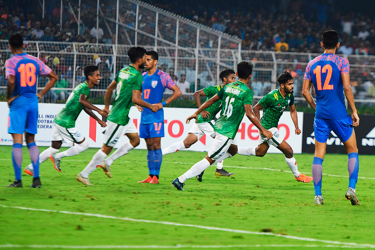 Bangladesh`s Saad Uddin (2R) celebrates after scoring a goal during the World Cup 2022 and 2023 AFC Asian Cup qualifying football match between India and Bangladesh, at the Vivekananda Yuba Bharati Krirangan in Kolkata on 15 October 2019. Photo: AFP