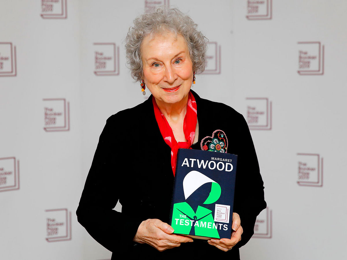 Canadian author Margaret Atwood poses with her book `The Testaments` during the photo call for the authors shortlisted for the 2019 Booker Prize for Fiction at Southbank Centre in London on October 13, 2019.