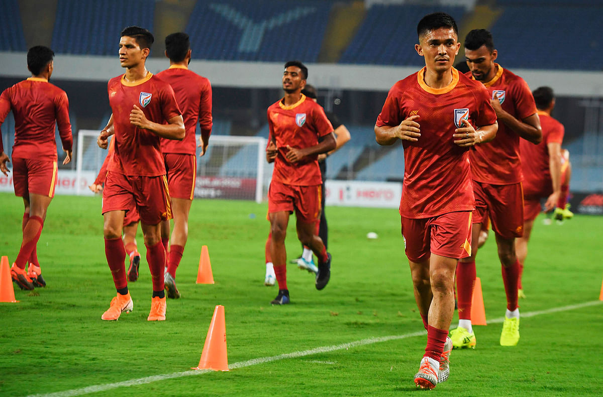 India`s national football team captain Sunil Chhetri (2R) along with teammates takes part in a training session with teammates ahead of their World Cup 2022 and 2023 AFC Asian Cup qualifying football match against Bangladesh, at the Vivekananda Yuba Bharati Krirangan in Kolkata on 14 October, 2019. Photo: AFP