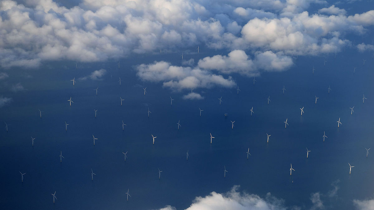 In this file photo taken on 8 November 2017 Burbo Bank Offshore Wind Farm on the Burbo Flats in Liverpool Bay, operated by DONG Energy, is pictured from the the window of an aircraft flying over the Irish Sea, off the west coast of northern England. Photo: AFP