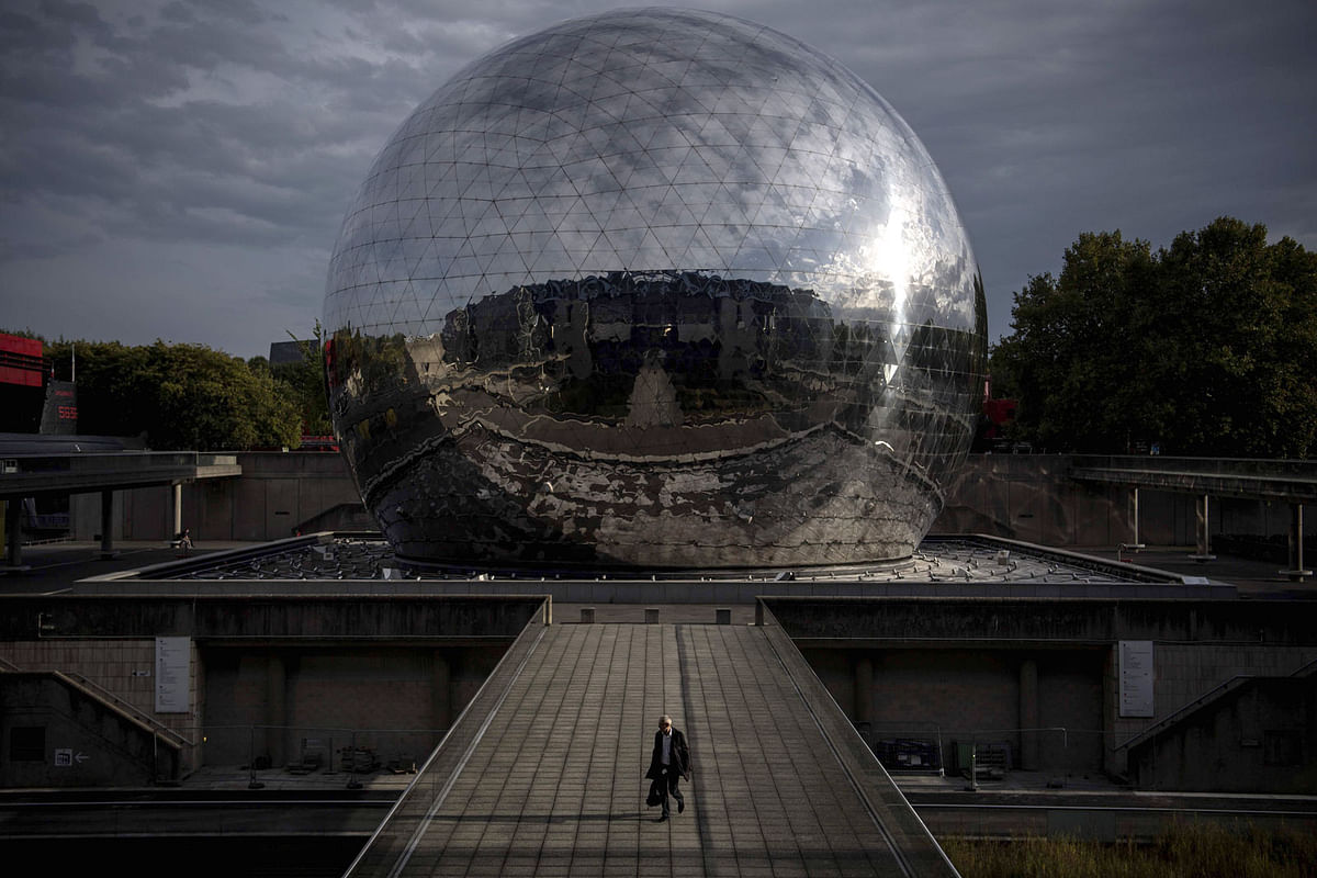 . A man walks past the `Geode`, a steel sphere housing a screening room at the Cite des Sciences et de l`Industrie ( City of Science and Industry), on 14 October 2019 in Paris. Photo: AFP