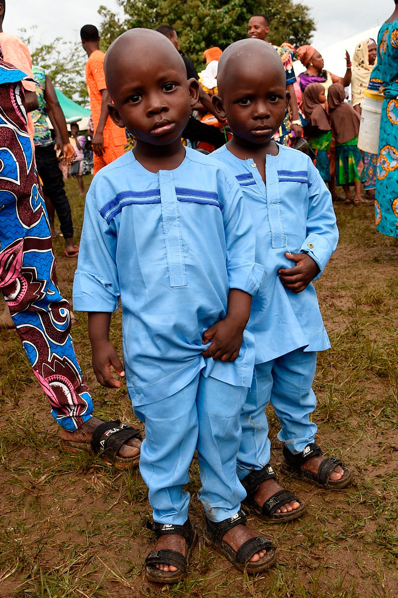 Young twins attend the Igbo-Ora World Twins festival to celebrate the uniqueness in multiple births at Igbo-Ora Town in Oyo State, southwest Nigeria, on 12 October 2019. Photo: AFP