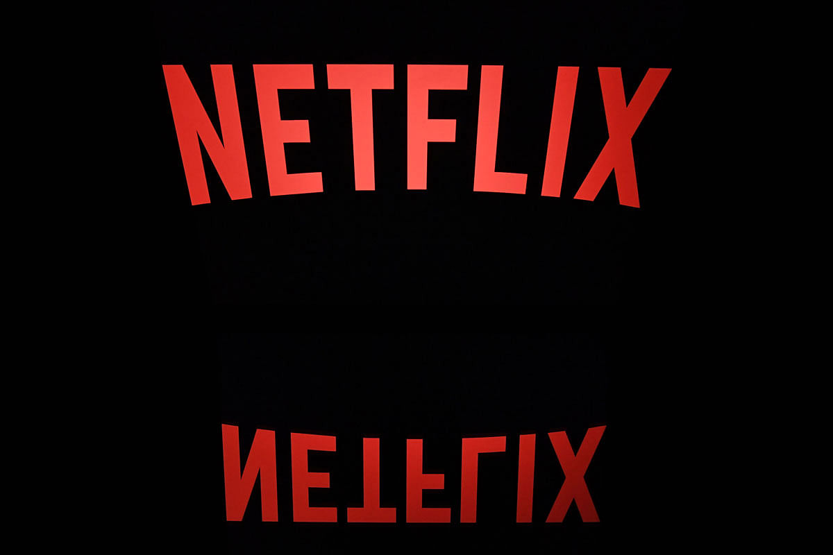 In this file photo taken on 10 July 2019, the Netflix logo is seen on a phone in this photo illustration in Washington, DC. AFP File Photo