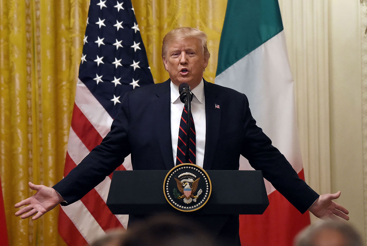 US president Donald Trump answers questions during a joint press conference with Italian President Sergio Mattarella (not pictured) at the White House in Washington, DC, on 16 October. Photo: AFP