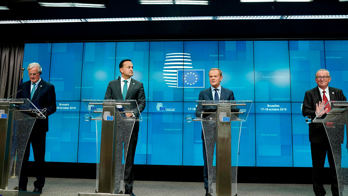 EU chief Brexit negotiator Michel Barnier, Ireland`s prime minister Leo Varadkar, European Council president Donald Tusk and European Commission president Jean-Claude Juncker address a press conference during an European Union Summit at European Union Headquarters in Brussels on 17 October 2019. Photo: AFP