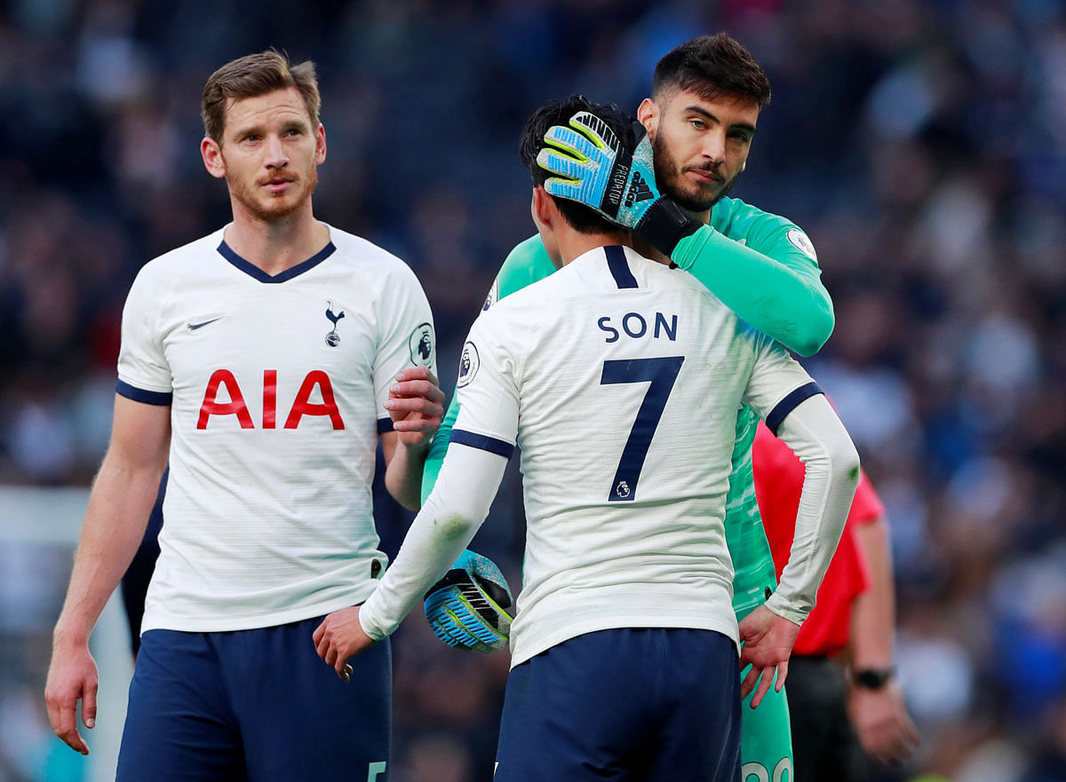 Tottenham Hotspur`s Son Heung-min and Paulo Gazzaniga after the match. Photo: Reuters