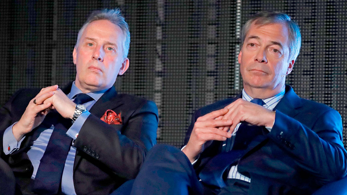 DUP (Democratic Unionist Party) MP Ian Paisley jnr (L) and Brexit Party leader Nigel Farage (R) take part in a panel discussion in Westminster, central London on 18 October 2019, on The Brexit Party’s case for a Clean-Break Brexit as the only solution. Photo: AFP