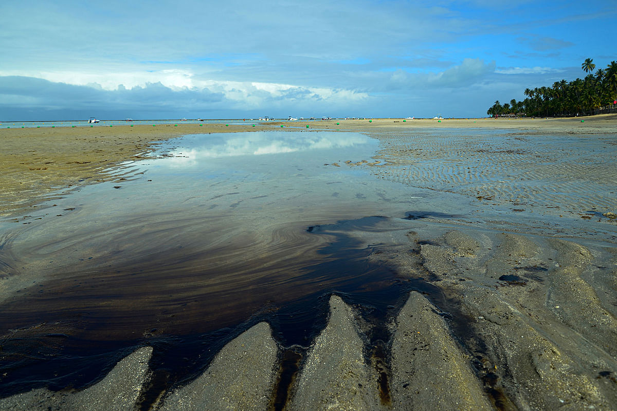 An oil spill is seen on Carneiros beach in Tamandare, Pernambuco state, Brazil on 18 October 2019. Photo: Reuters