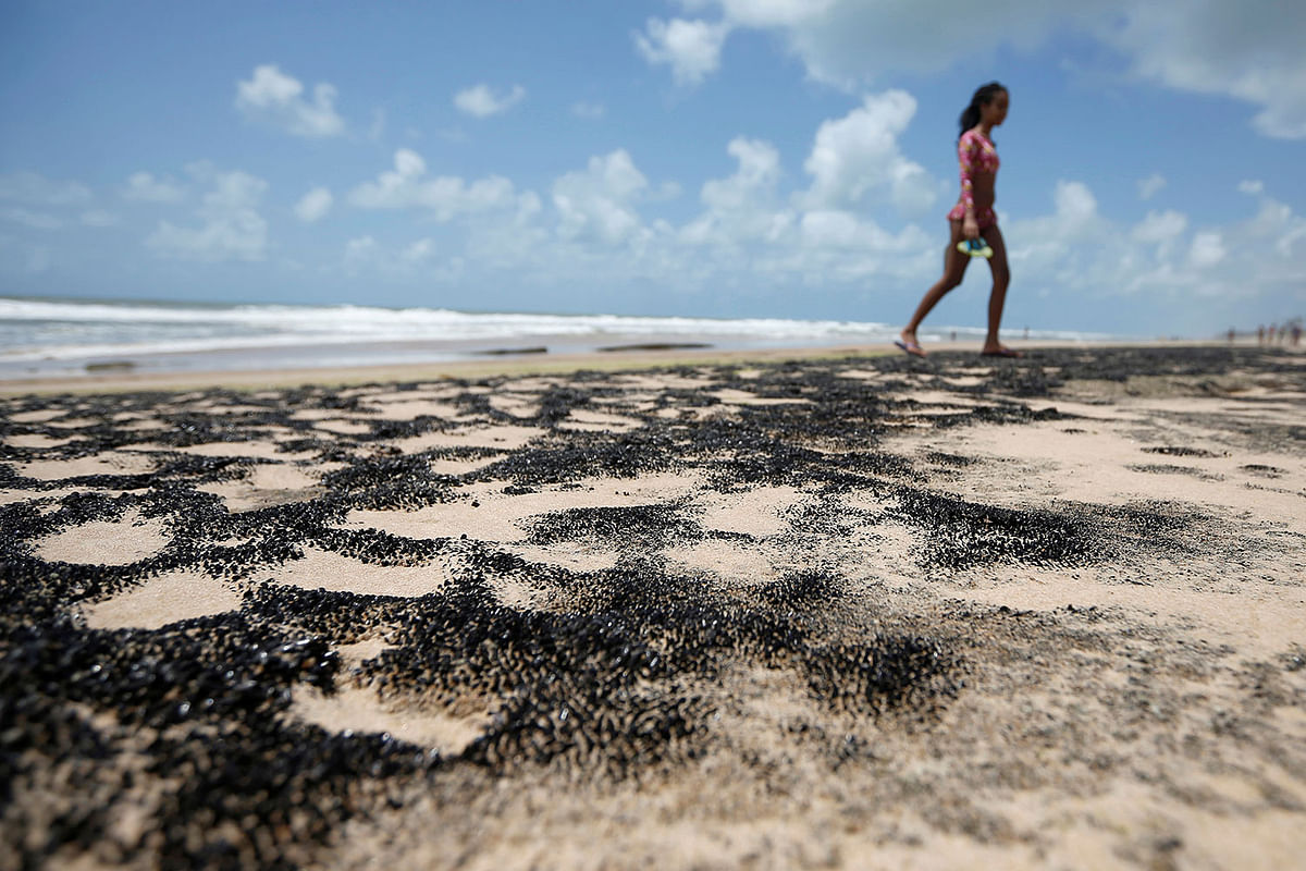 An oil spill is seen on `Sitio do Conde` beach in Conde, Bahia state, Brazil on 12 October 2019. Photo: Reuters