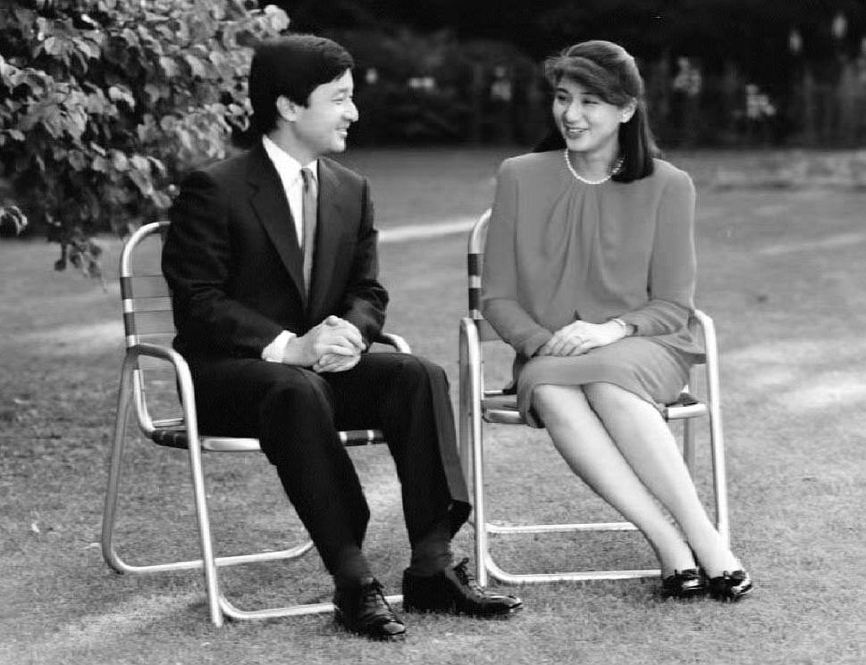 In this file photo provided by the Japanese Imperial Palace on 1 June 1993, then-Crown Prince Naruhito (L) and his bride, former diplomat Masako Owada (R), sit and talk at the couple`s new residence in the Akasaka Palace in Tokyo. Photo: AFP