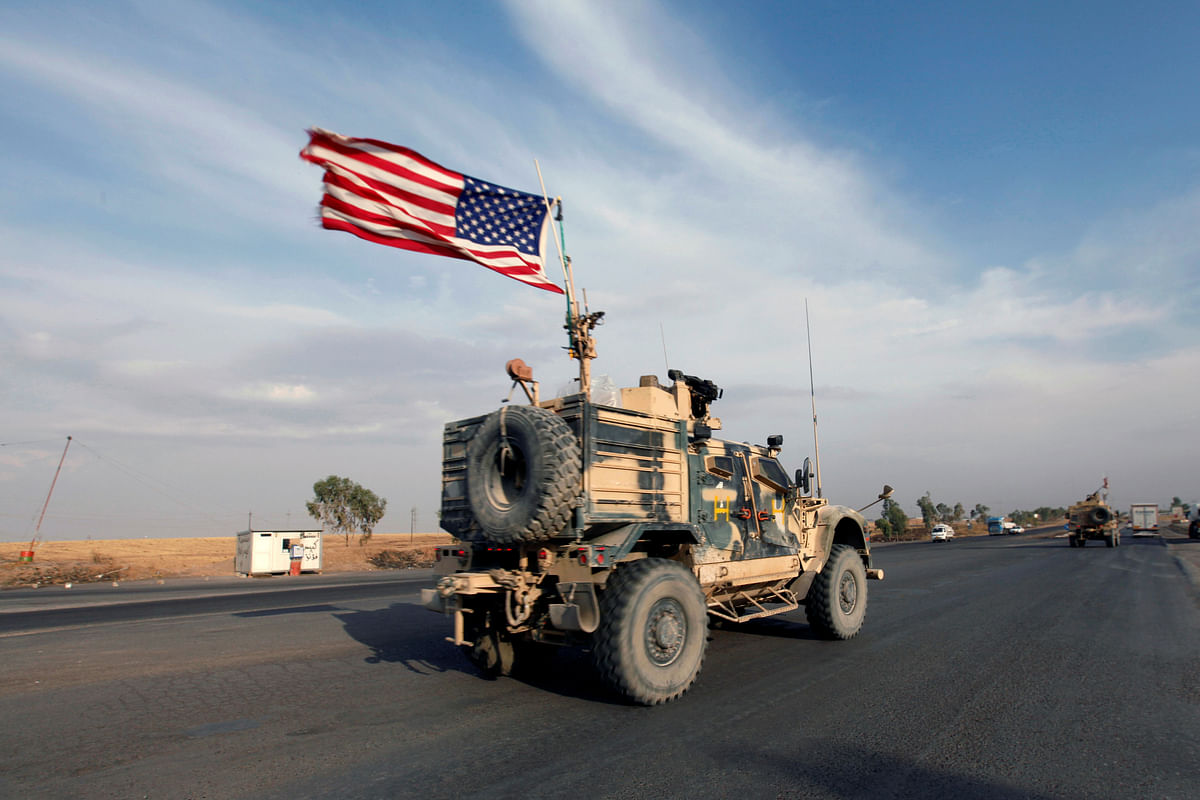 A convoy of US vehicles is seen after withdrawing from northern Syria, in Erbil. Photo: Reuters