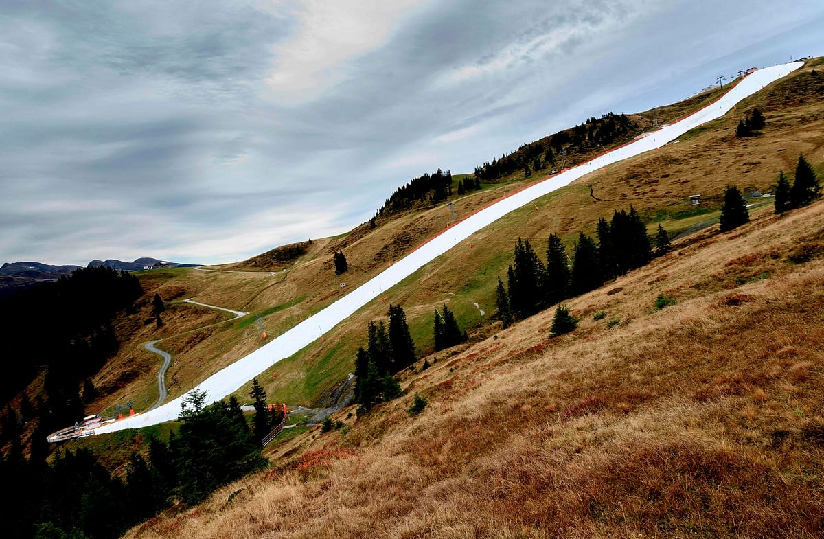 Picture shows a downhill slope, covered with conserved snow from last winter, at the Resterhoehe of Kitzbuehel ski resort, near Mittersill, Austria on 20 October 2019. Photo: AFP