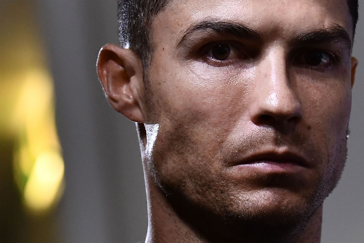 Juventus` Portuguese forward Cristiano Ronaldo looks on within a press conference on 21 October 2019 in Turin, on the eve of Juventus` UEFA Champions League stage Group D match against Lokomotiv Moscow. Photo: AFP