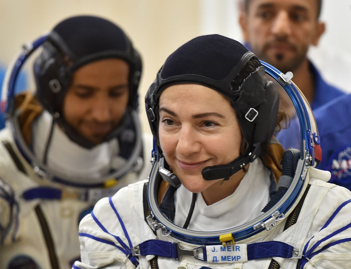 In this file photo taken on 25 September 2019, International Space Station (ISS) crew member US astronaut Jessica Meir smiles during a testing of her space suits before boarding a Soyuz rocket to the ISS at the Russian-leased Baikonur cosmodrome in Kazakhstan. Photo: AFP