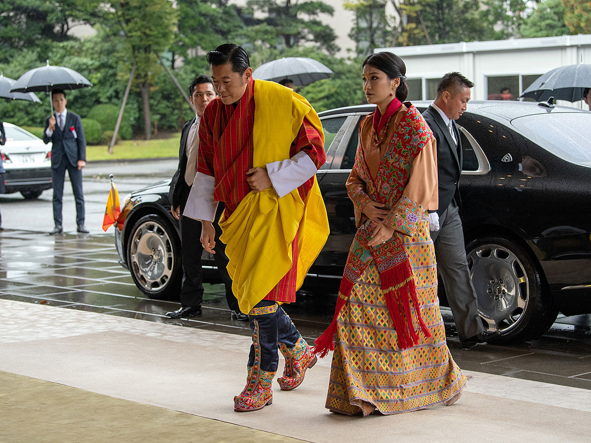 Bhutan`s King Jigme Khesar Namgyel Wangchuck and Queen Jetsun Pema arrive for the enthronement ceremony of Japan`s Emperor Naruhito at the Imperial Palace in Tokyo, Japan on 22 October 2019. Photo: AFP