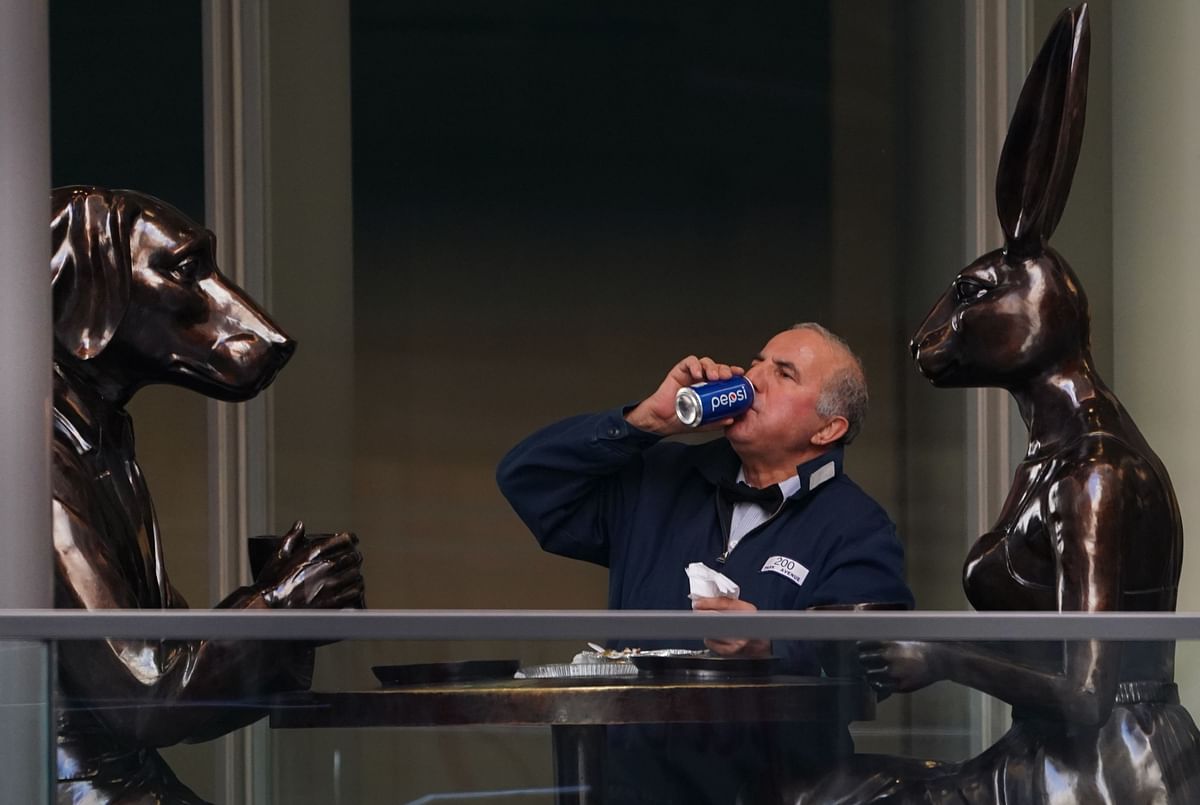 A man has lunch at at a table alongside the sculpture by artist Gillie and Marc called `Table of Love` in New York City on 21 October 2019. Photo: AFP