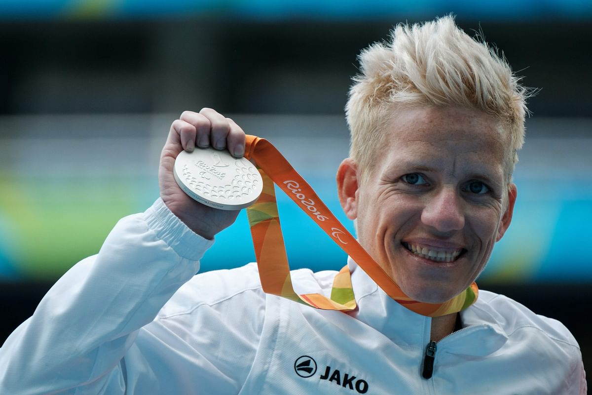 In this file photo taken on 10 September 2016 Belgium`s Marieke Vervoort reacts on the podium after receiving the silver medal for the women`s 400 m (T52) of the Rio 2016 Paralympic Games at the Olympic Stadium in Rio de Janeiro. Photo: AFP