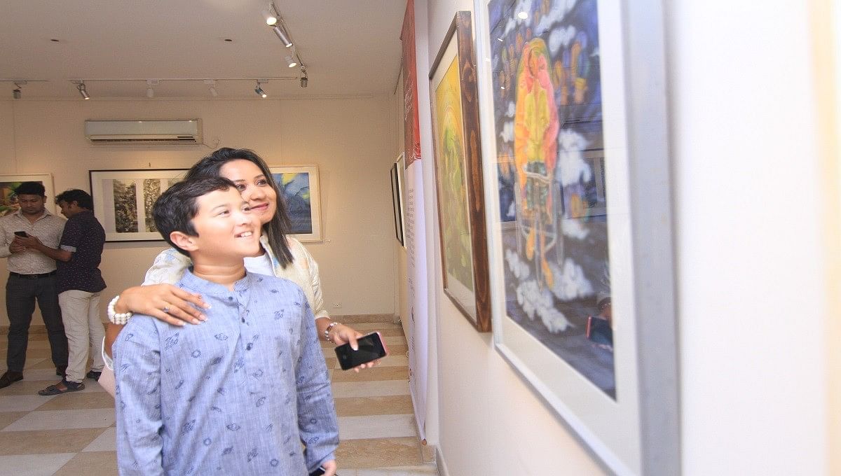 Visitors at ‘Prachcher Pracheen Dhara’ exhibition in Mohakhali, Dhaka. Photo: UNB