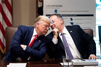 US President Donald Trump(L) listens to US Secretary of State Mike Pompeo during a Cabinet Meeting at the White House in Washington, DC. Photo: AFP