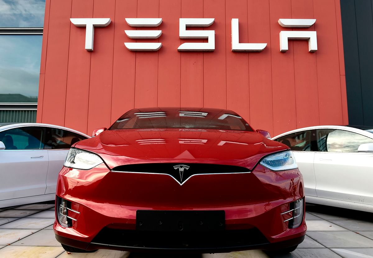 The logo marks the showroom and service center for the US automotive and energy company Tesla in Amsterdam on 23 October. Photo: AFP