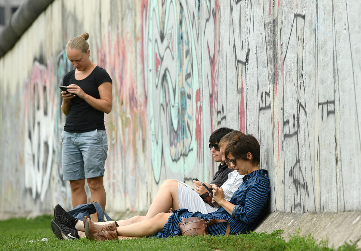 People visit the Berlin Wall memorial site in Bernauer Strasse in Berlin. Photo: Reuters