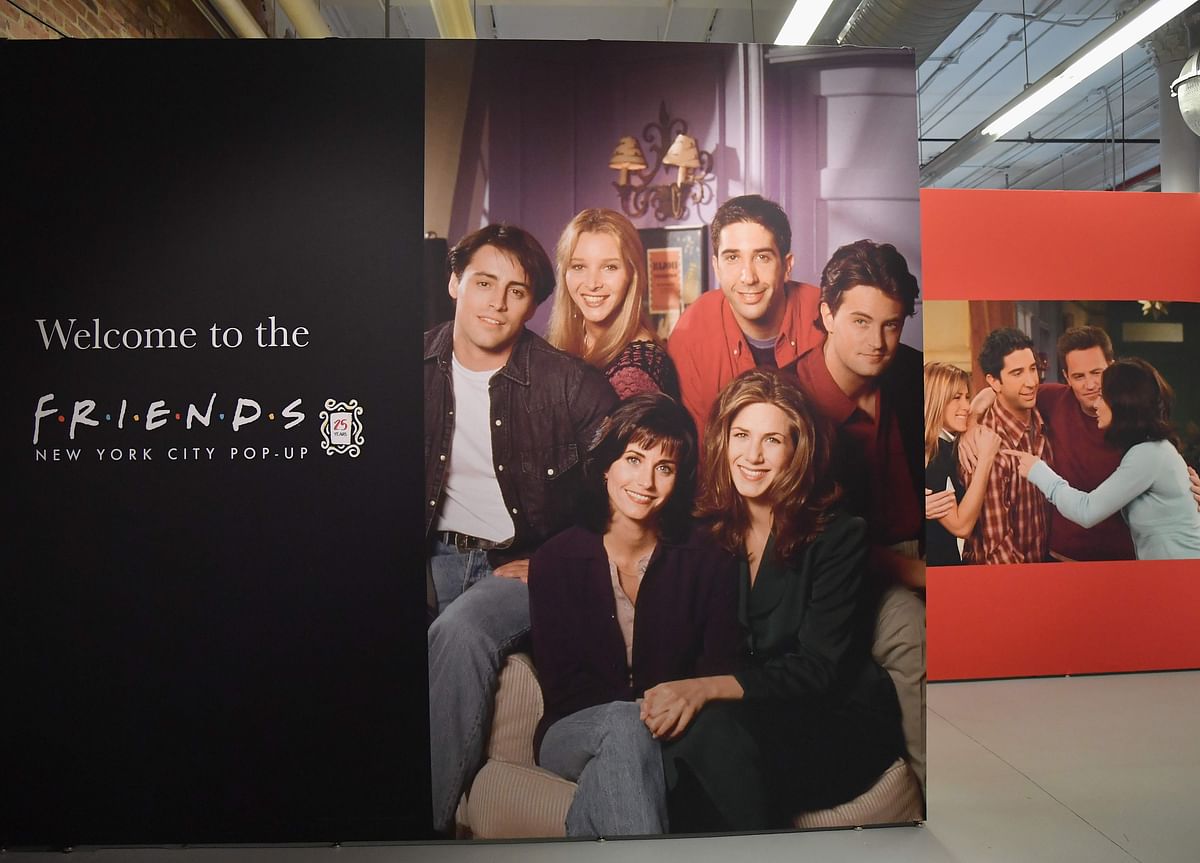 In this file photo taken on 5 September Posters of the `Friends` cast are seen during the Friends New York City Pop-Up press preview in New York. Photo: AFP
