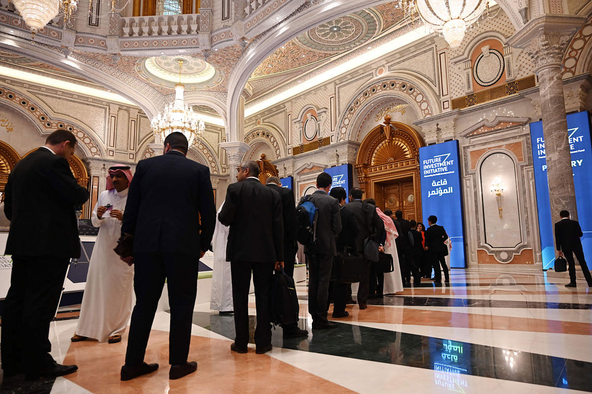 Delegates wait in line ahead of a session during the Future Investment Initiative (FII) forum at the King Abdulaziz Conference Centre in Saudi Arabia`s capital Riyadh, on 29 October 2019. Photo: AFP