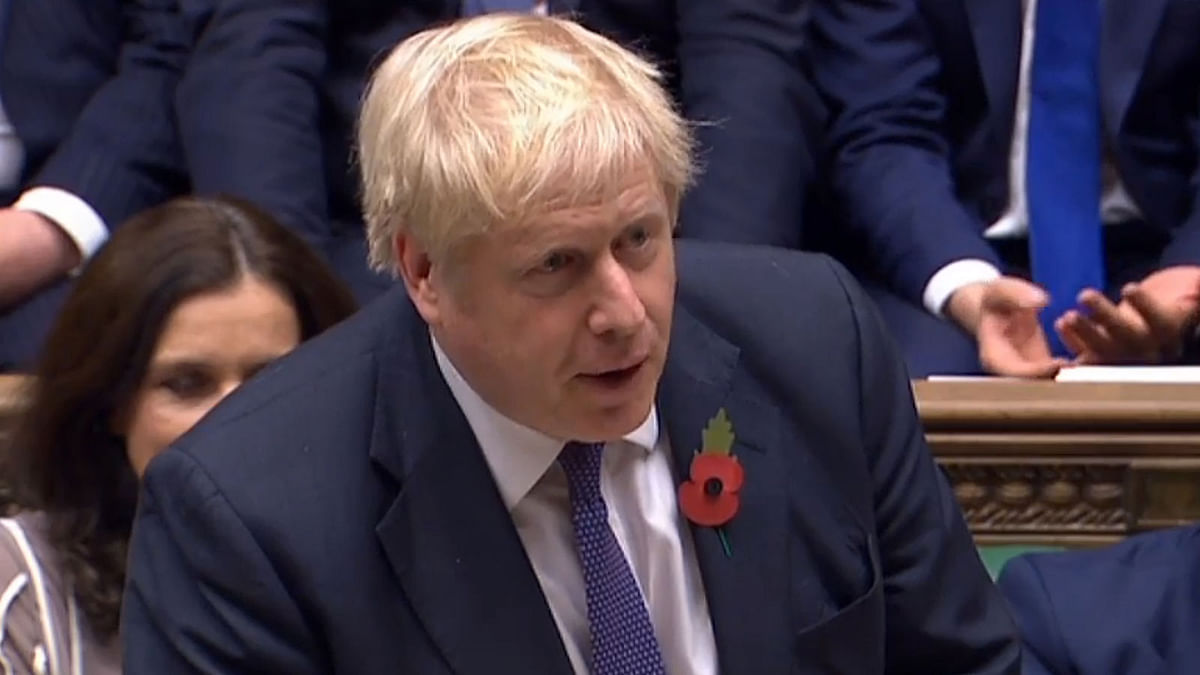 A video grab from footage broadcast by the UK Parliament`s Parliamentary Recording Unit (PRU) shows Britain`s prime minister Boris Johnson speaking in the House of Commons in London on 28 October, after losing a vote for an Early Parliamentary General Election. Photo: AFP