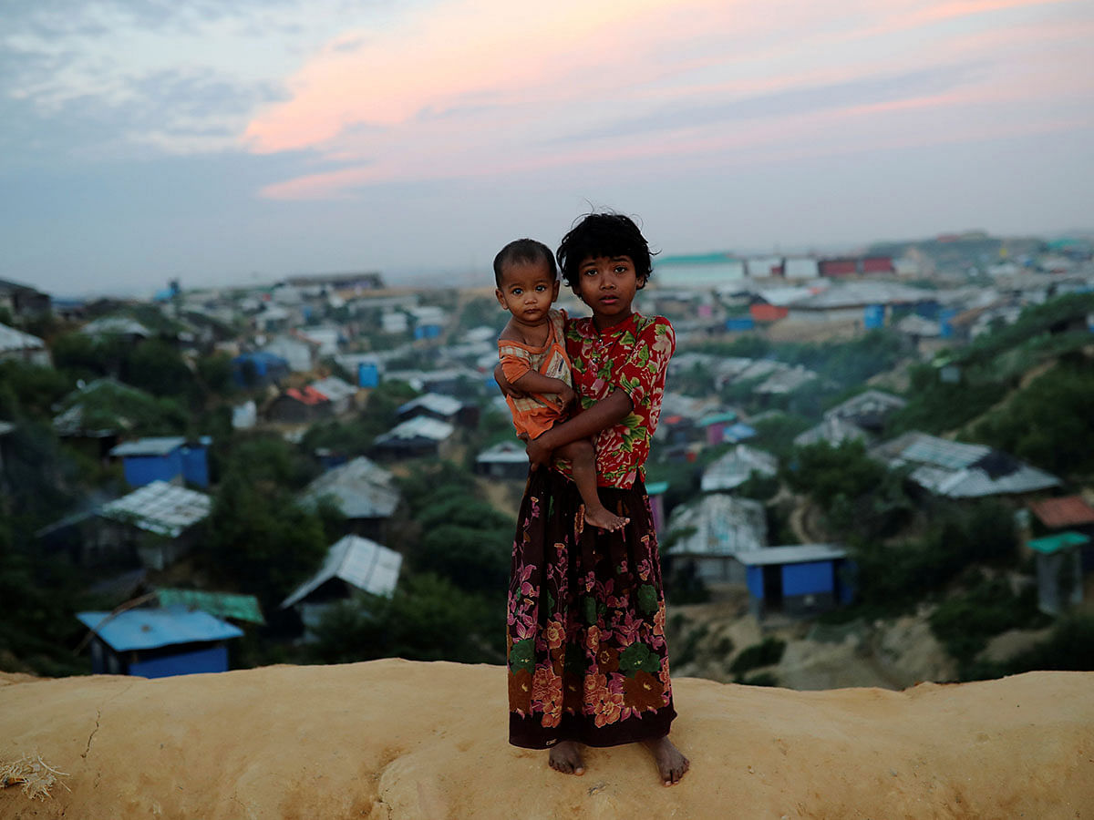 Rohingya refugee children pose for a picture at the Balukhali camp in Cox`s Bazar, Bangladesh, on 15 November 2018. Reuters File Photo