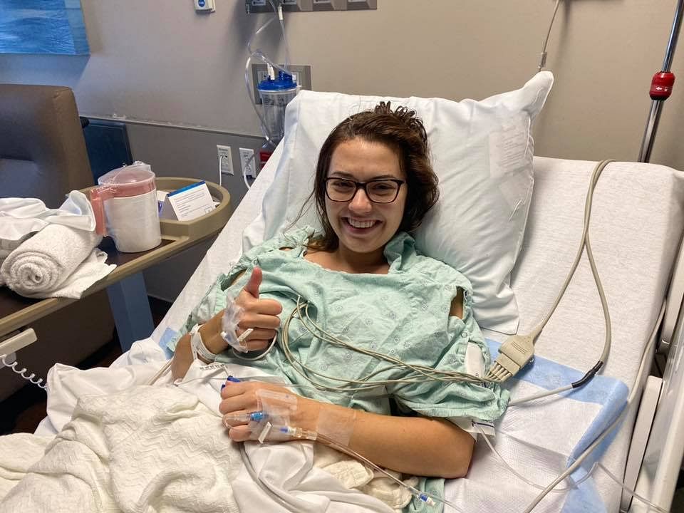 In this 29 October 2019, image courtesy of Methodist Dallas Medical Center in Dallas, Texas, Jenna Chardt, 25, smiles after undergoing brain surgery. Photo: AFP