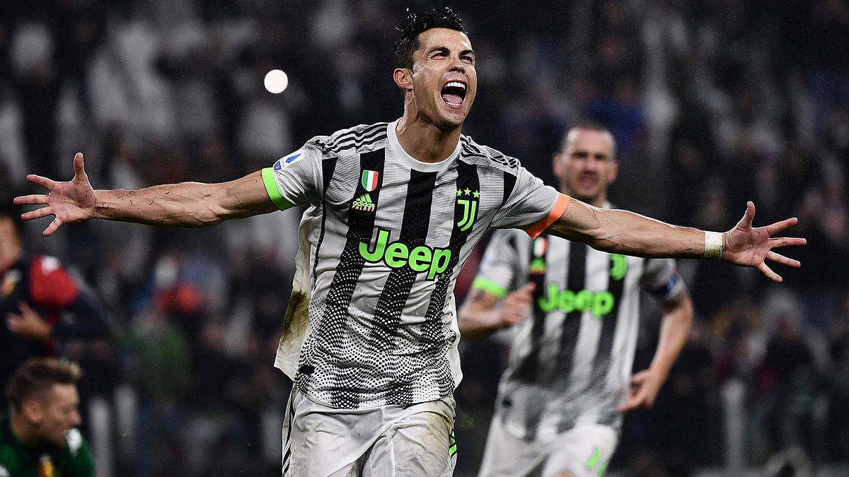Juventus` Portuguese forward Cristiano Ronaldo celebrates scoring his team`s second goal during the Italian Serie A football match between Juventus and Genoa on Wednesday at the `Allianz Stadium` in Turin. Photo: AFP