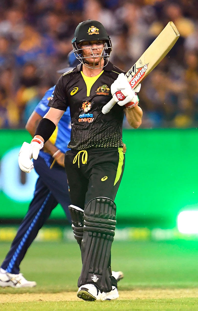 Australia`s David Warner celebrates scoring 50 runs against Sri Lanka during their Twenty20 cricket match played in Melbourne on 1 November , 2019. Photo: AFP