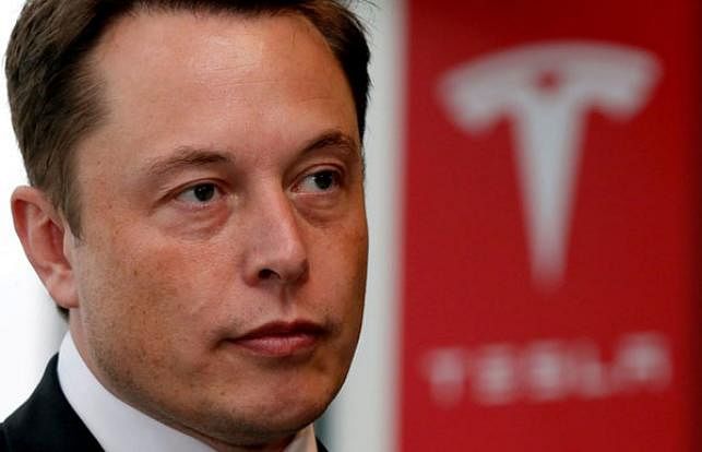 Tesla Motors Inc chief executive Elon Musk pauses during a news conference in Tokyo, Japan, 8 September 2014. Photo: Reuters