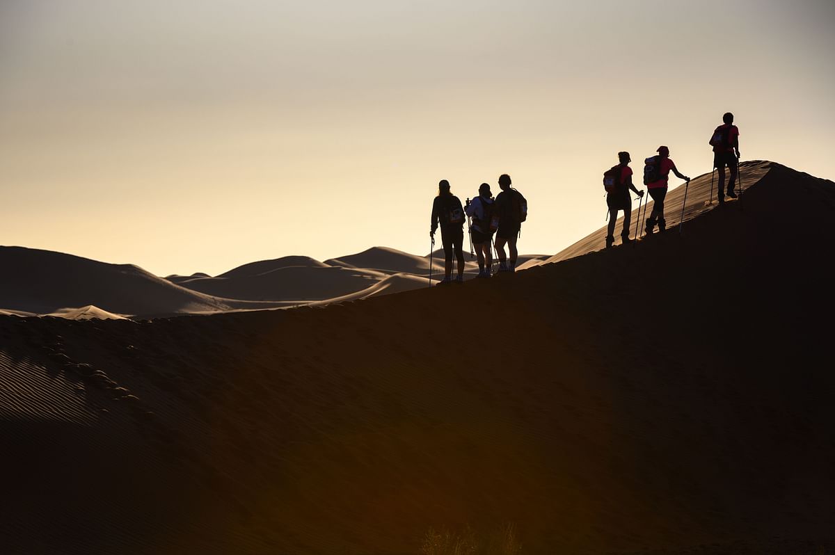 Women take part in the desert trek `Rose Trip Maroc`, on 2 November 2019 in the erg Chebbi near Merzouga. Photo: AFP
