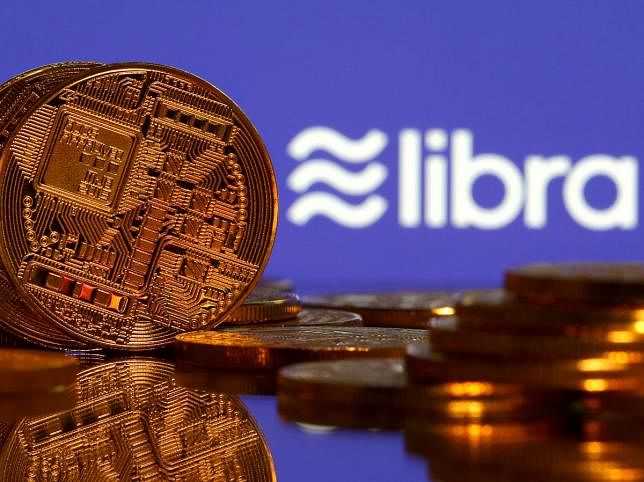 Representations of virtual currency and Libra logo. Photo: Reuters