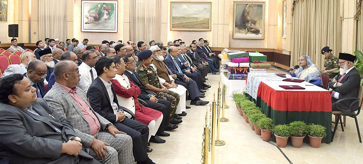 Prime minister Sheikh Hasina addresses a programme of receiving blankets from the Bangladesh Association of Banks (BAB) for the Prime Minister’s Relief and Welfare Fund at her official Ganabhaban residence in Dhaka on Saturday. Photo: PID