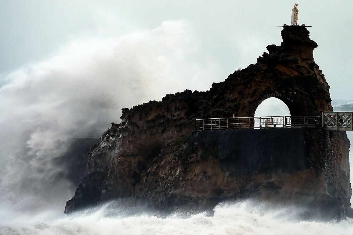 Waves break on the Rocher de La Vierge off the coast in Biarritz, south western France, on 3 November 2019 during the Amelie storm. Photo: AFP