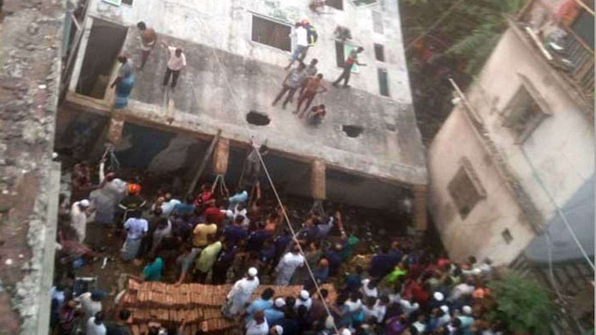 A four-storey building collapsed in Babubail area of Narayanganj city on Sunday. Photo: UNB