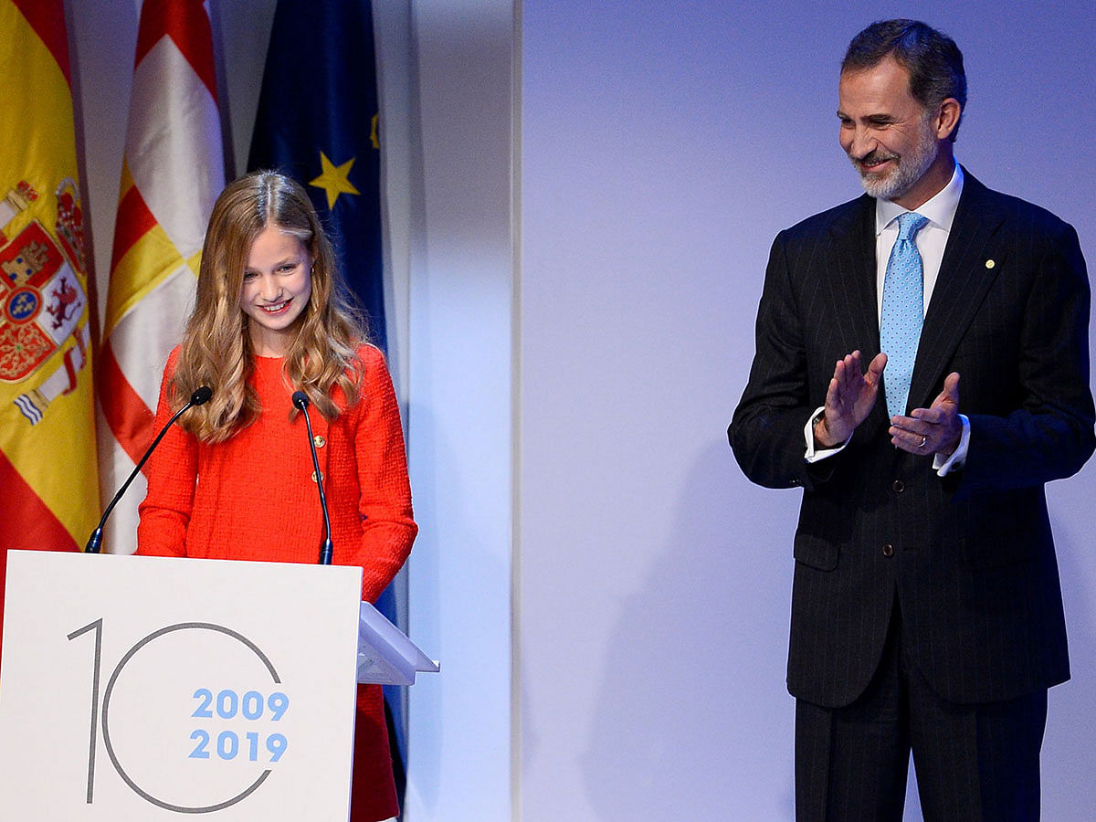 Leonor of Spain (L) and her father king Felipe VI take part in the Princess of Girona Foundation Awards (FPdGI) ceremony which marks its 10th anniversary, at Congress Palace of Catalonia, in Barcelona, on 4 November. 2019. Photo: AFP