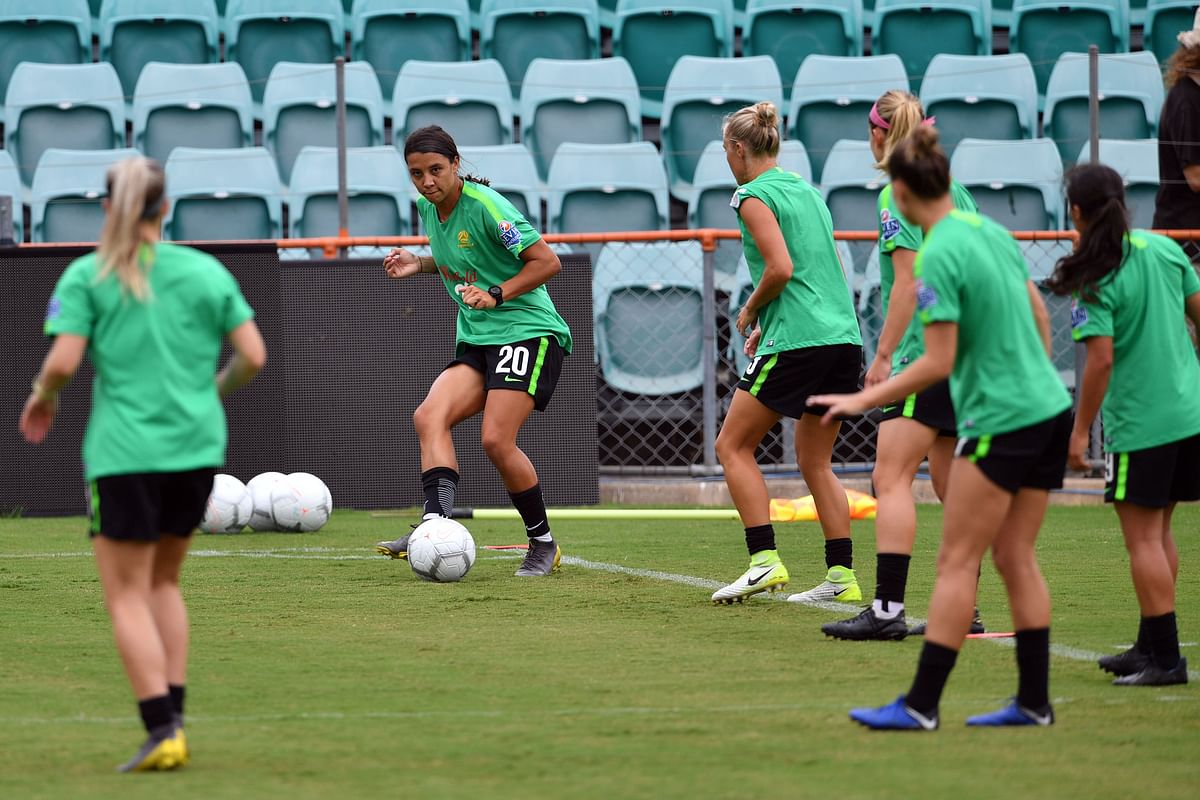 In this file photo taken on 27 February, striker Sam Kerr (2nd L) of Australia`s national women`s football team kicks the ball during a training session at Leichhardt Oval in Sydney. Photo: AFP