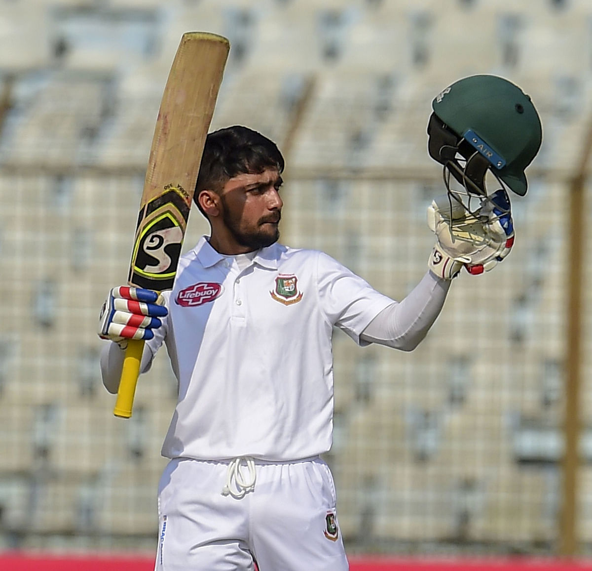 In this file photo taken on 22 November, 2018 Bangladesh cricketer Mominul Haque reacts after scoring a century during the first day of the first Test cricket match between Bangladesh and West Indies at the Zahur Ahmed Chowdhury Stadium in Chittagong. Photo: AFP