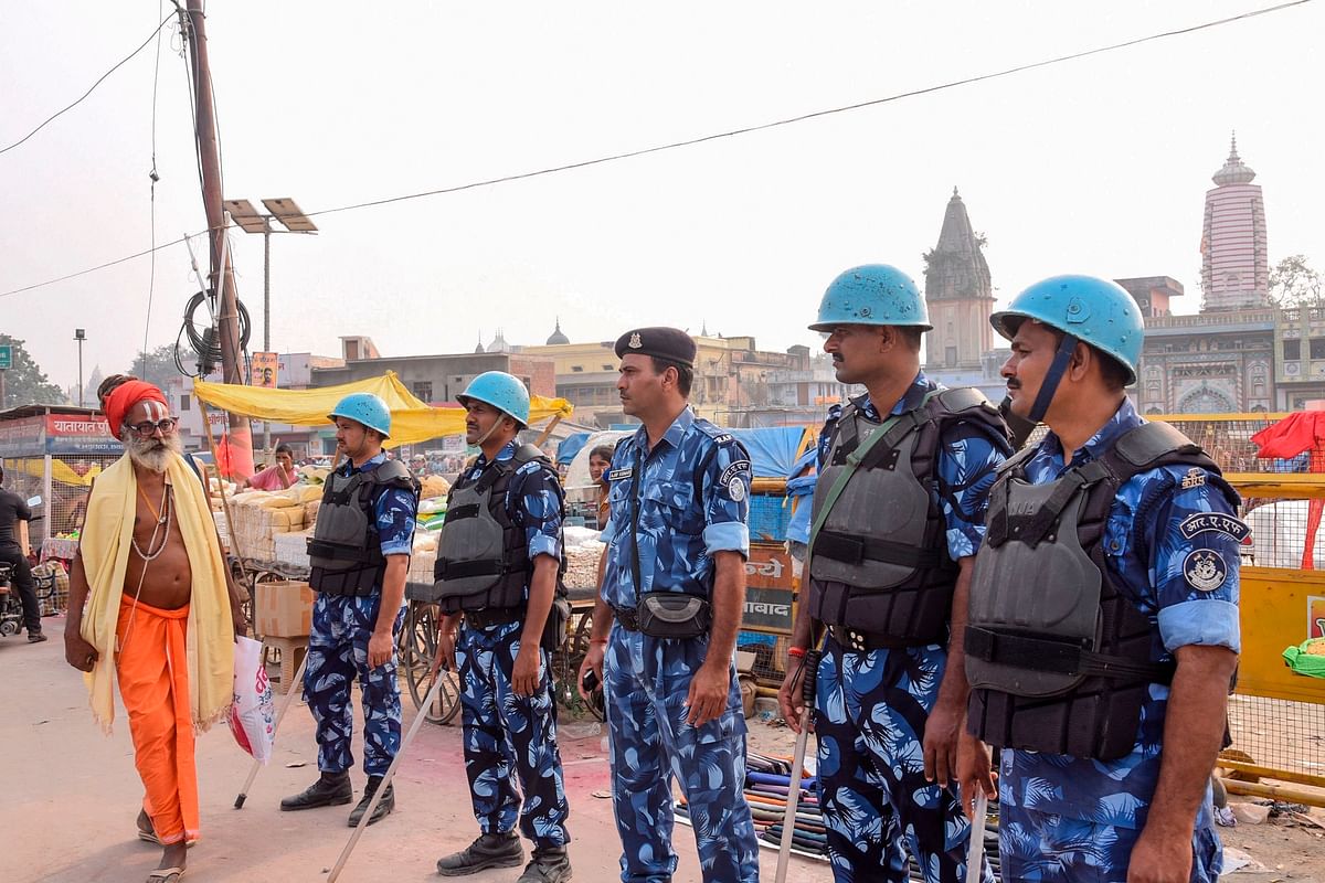 Security personnel stand guard on a street in Ayodhya on 7 November, 2019, as part of a security measure ahead of a Supreme Court verdict on disputed 16th-century Babri mosque. Photo: AFP