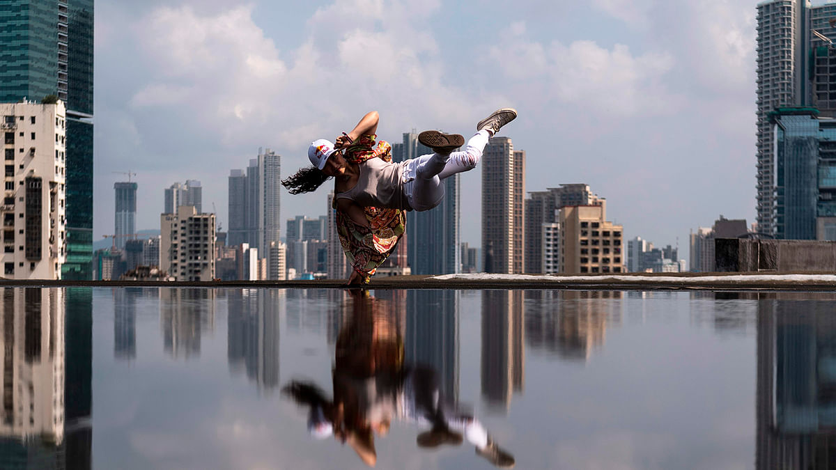 Japanese breakdancer Ami Yuasa, who got a wildcard entry to the Red Bull BC One world championships, dances during a photo session in Mumbai on 8 November 2019. Photo: AFP