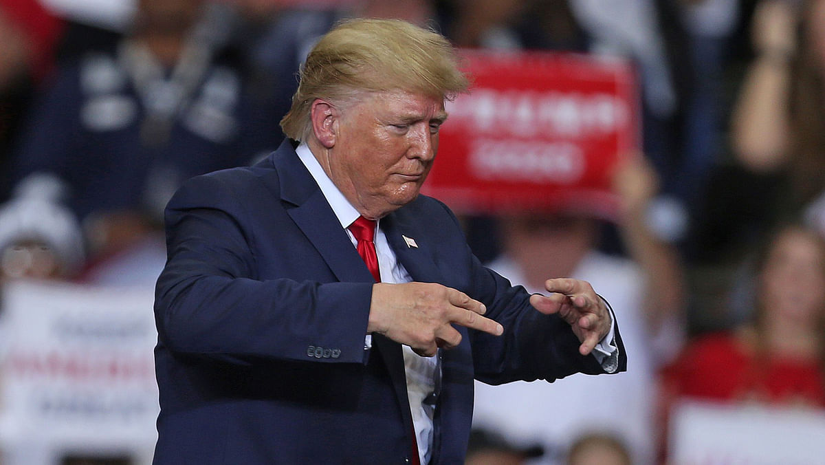US president Donald Trump gestures during a `Keep America Great` rally at the Monroe Civic Center on 6 November 2019 in Monroe, Louisiana. Photo: AFP